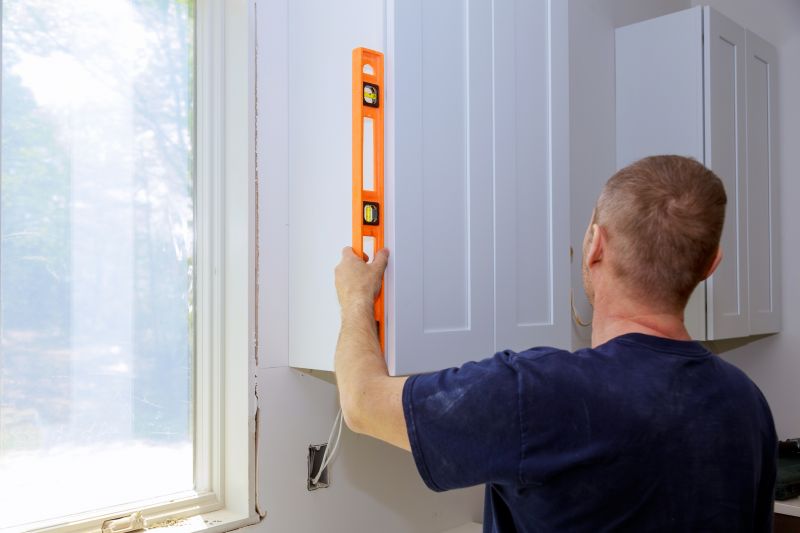 Team Installing Office Cabinets